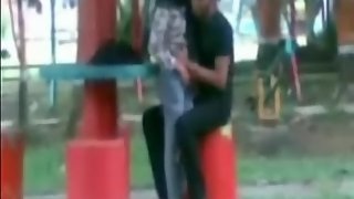 desi couple in park kissing